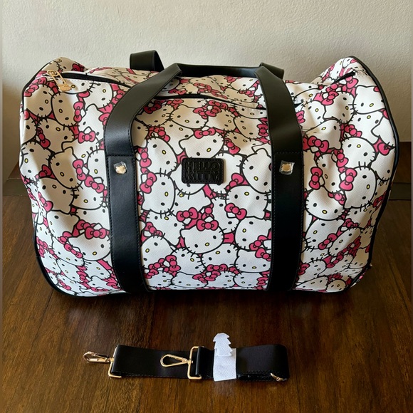 Hello Kitty | Bags | Hello Kitty Rolling Duffle Bag Luggage With Black ...